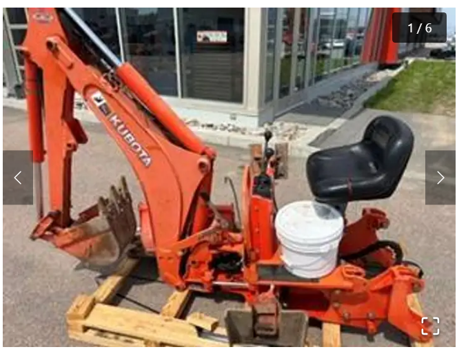 Kubota BH77 (2014)